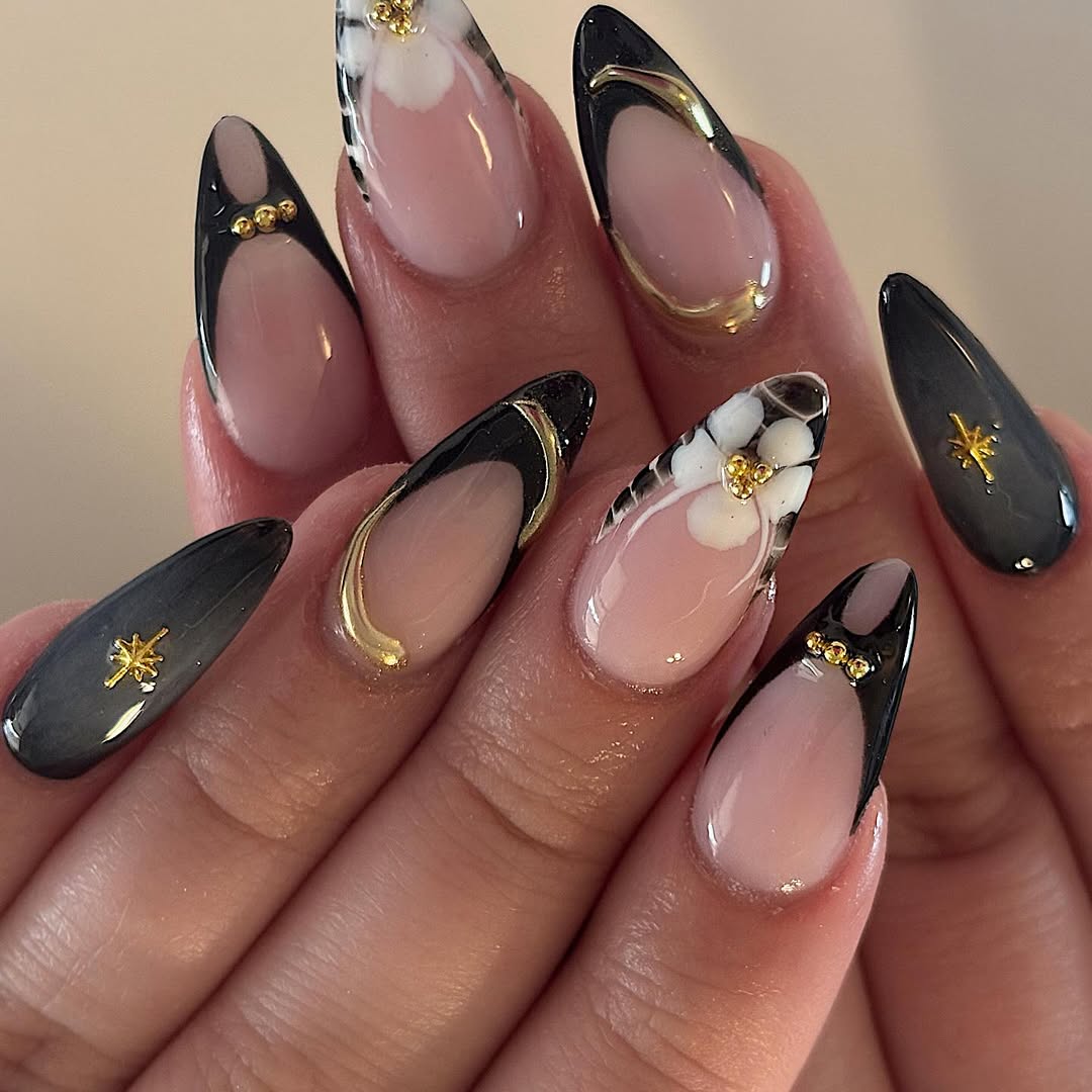 Almond Shaped Nails with Mixed Dark Designs