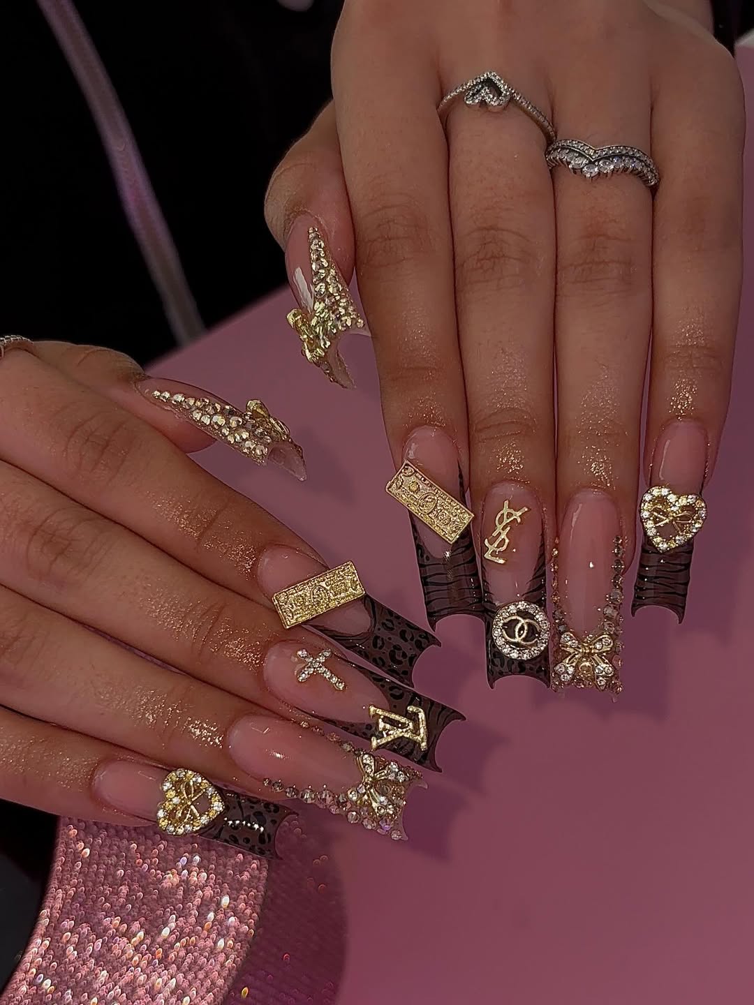 Black Animal Print and Designer Gold Charm Nails