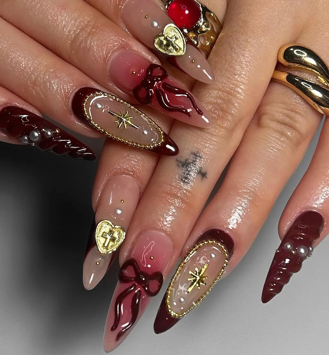 Burgundy Bows and Gold Embellishments