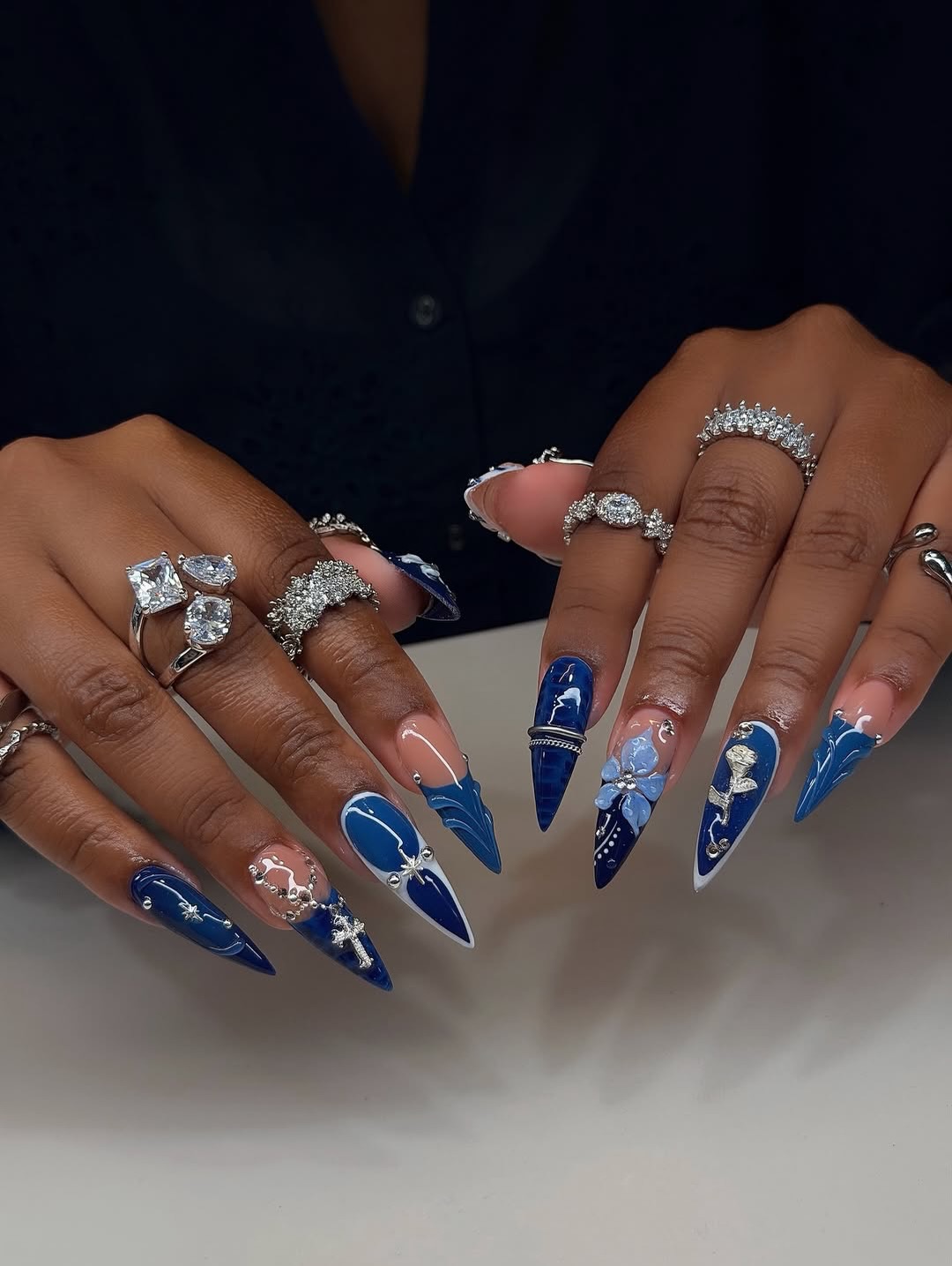 Dark Blue Stiletto Nails with Silver Charms