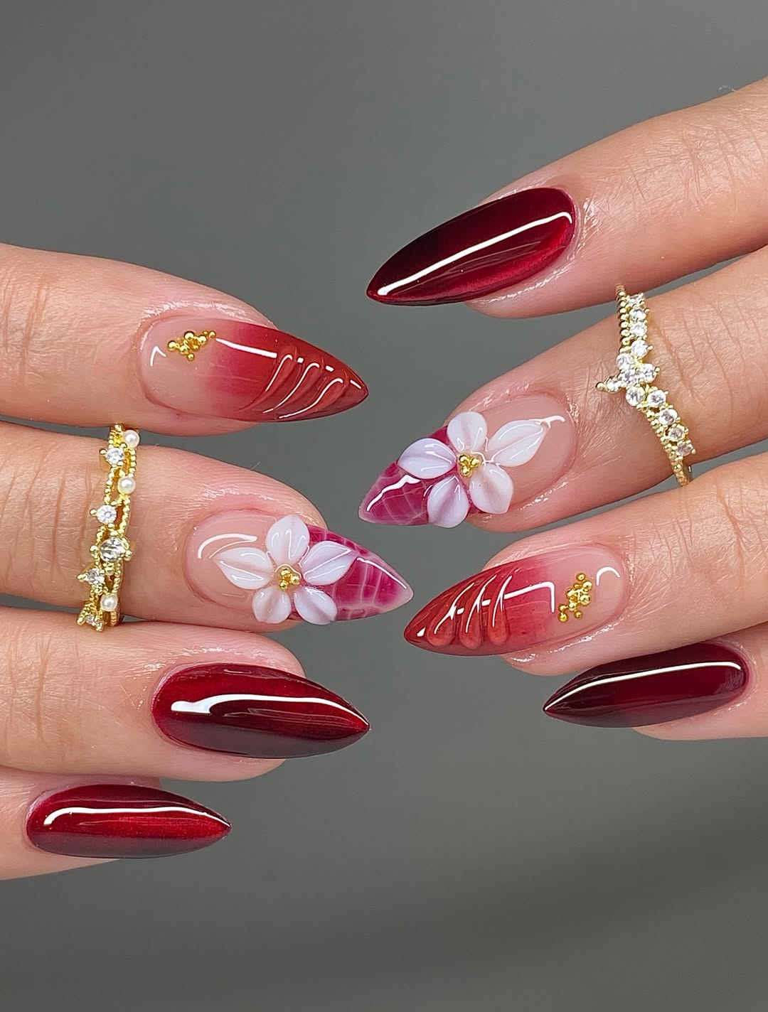 Deep Ruby Floral Almond Nails