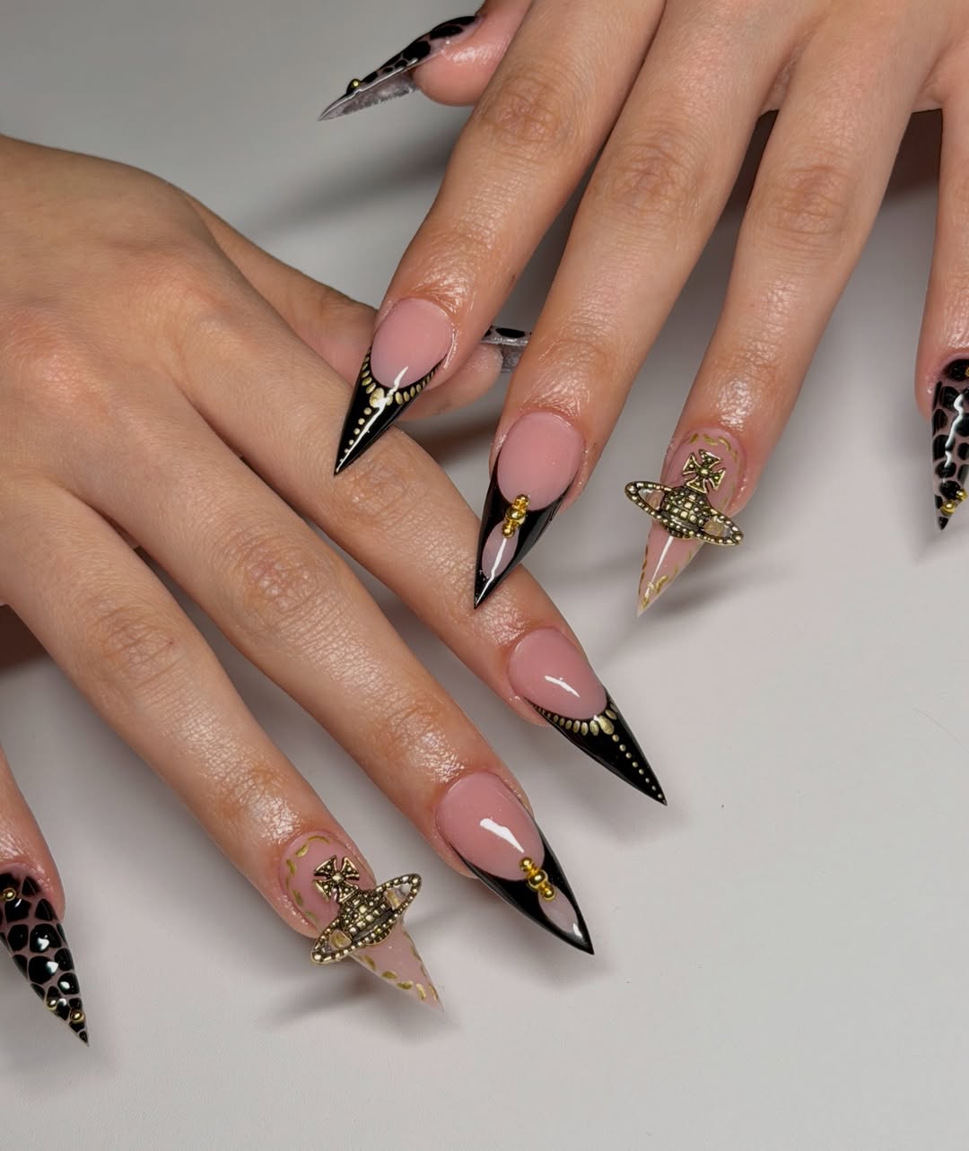 Extreme Stiletto Nails with Gold Charms