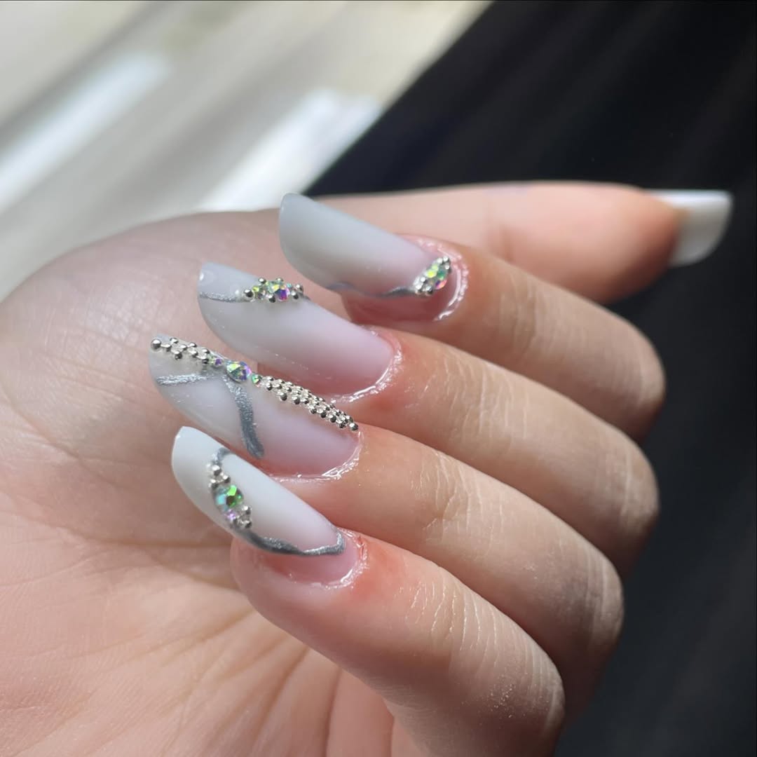 Frosted White Nails With Silver Jewels