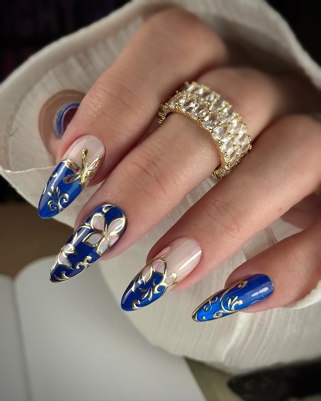 Gold Filigree and Royal Blue Almond Nails