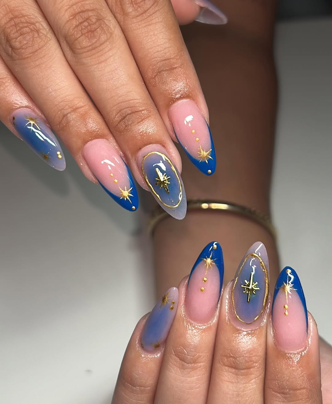 Gold Star and Blue Ombre Nails