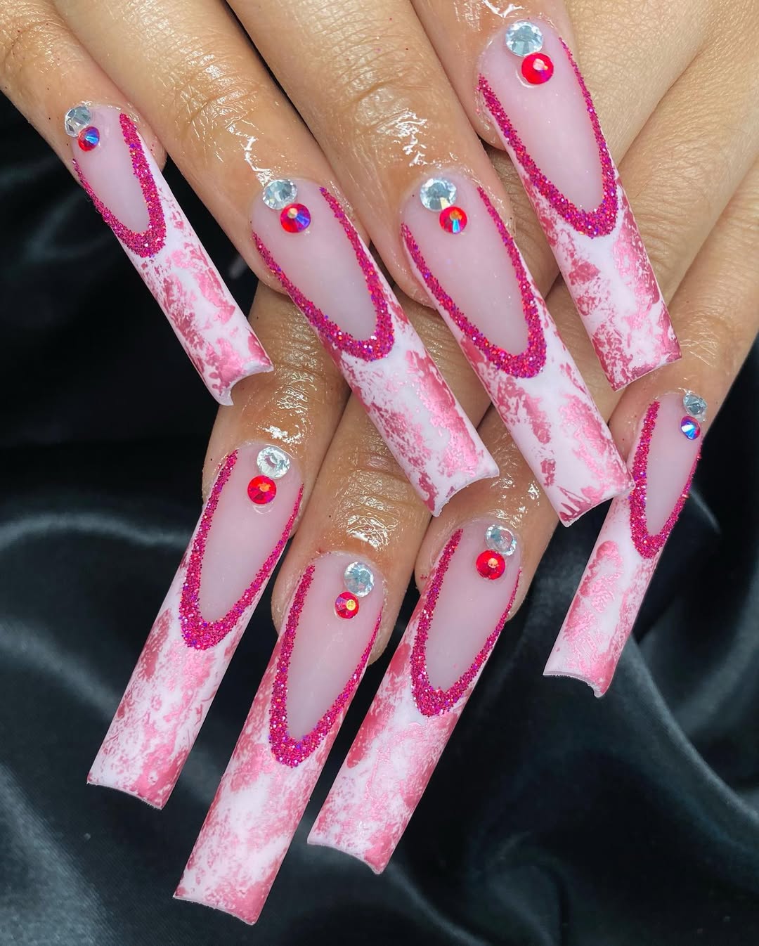 Long Pink Marble And Glitter Nails