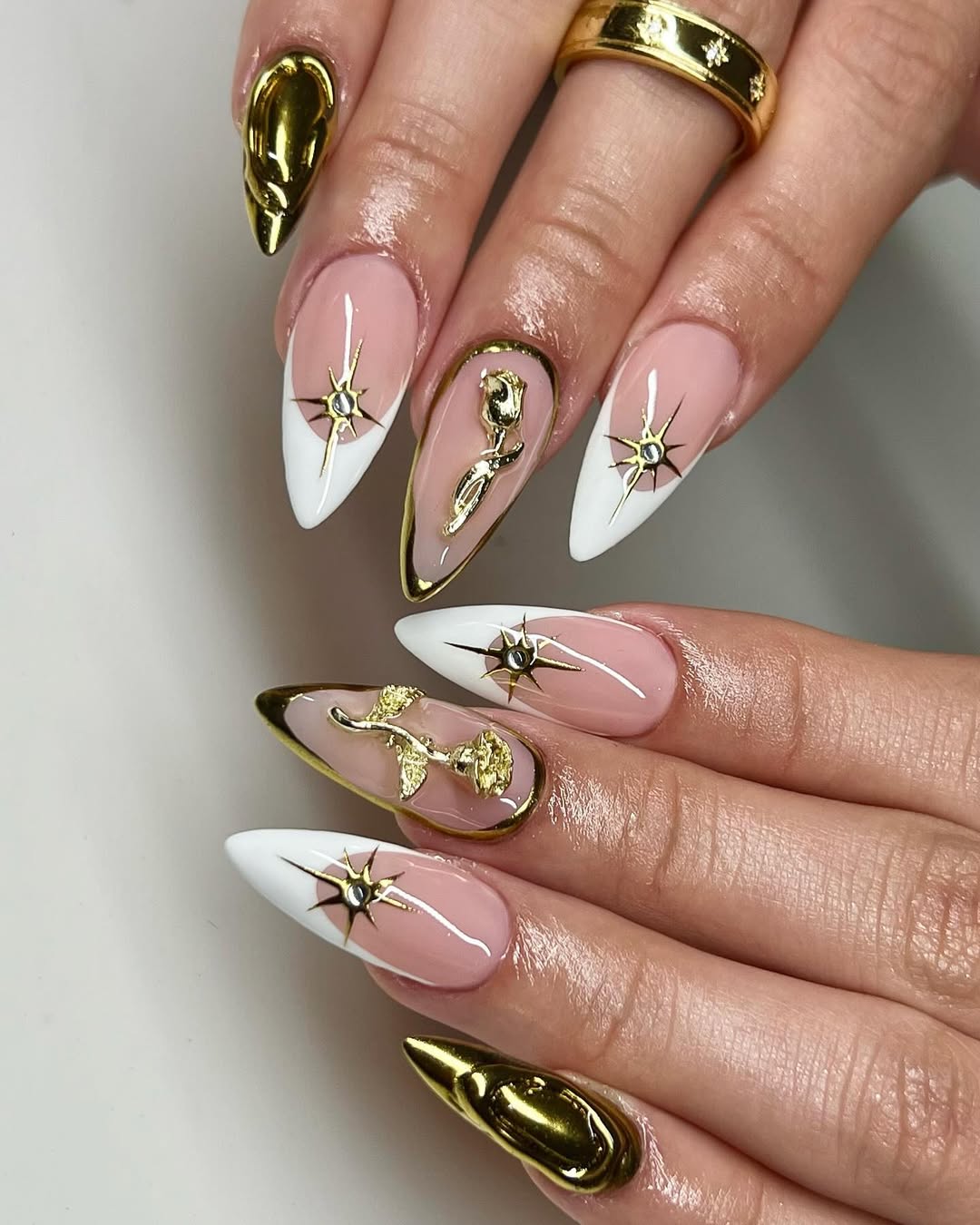Metallic Gold Rose and White Star Nails