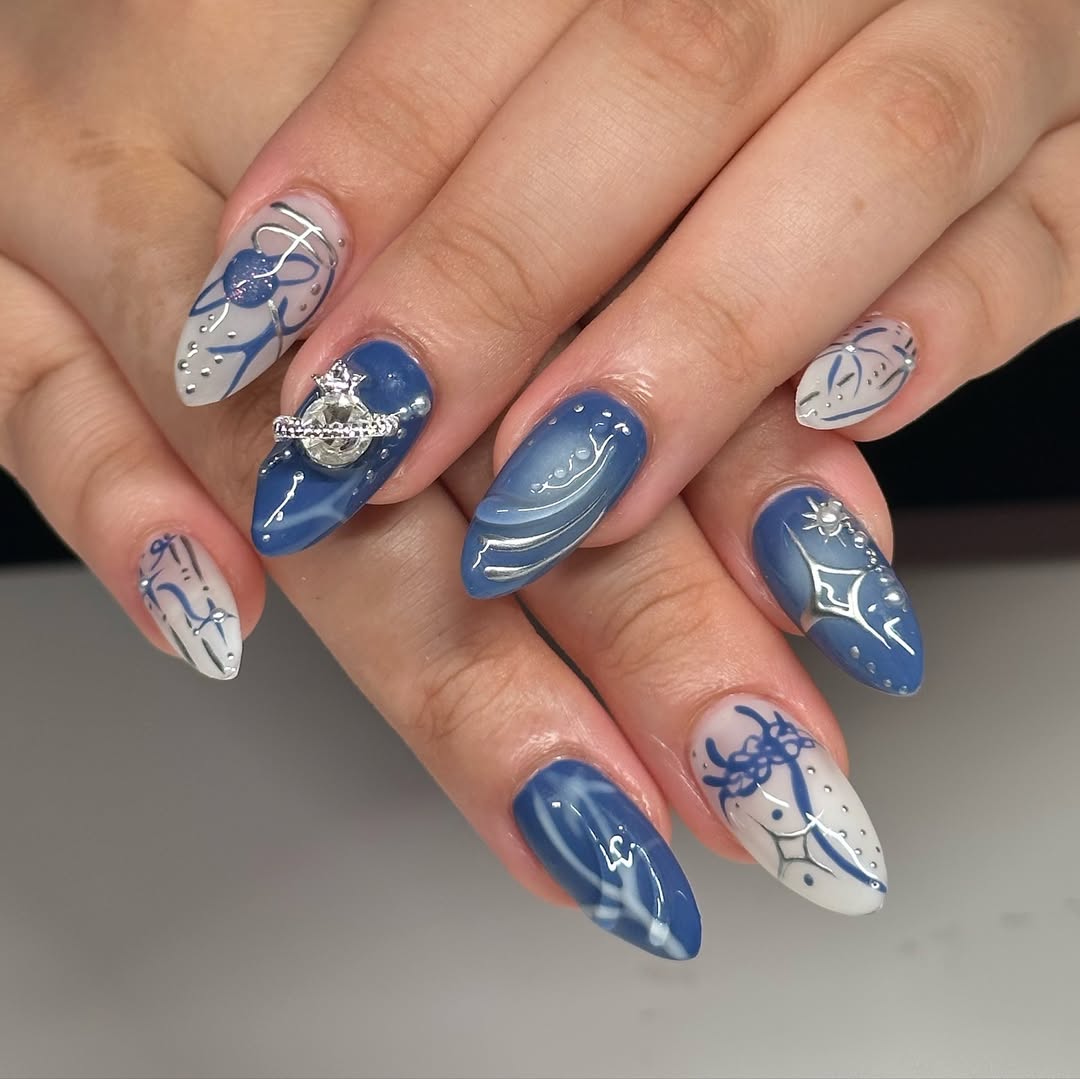 Milky Blue and Silver Planet Nails
