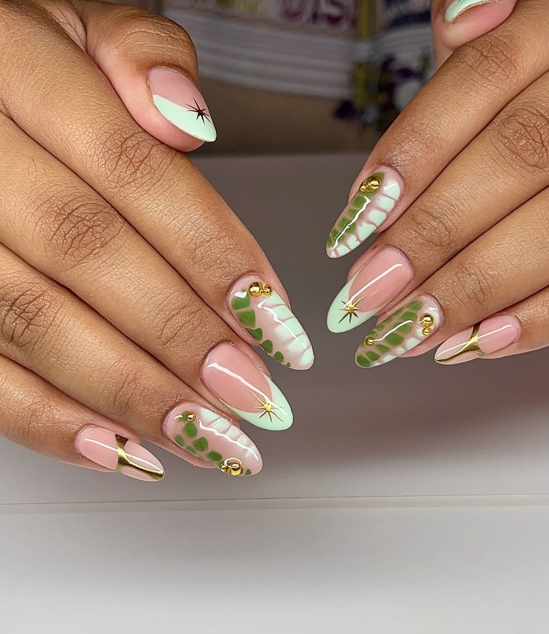 Mint Reptile Print and Gold Stars