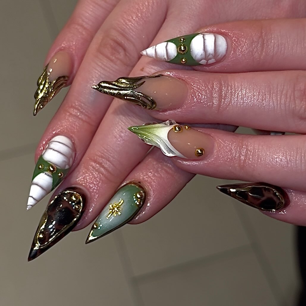 Ornate Emerald and Sculpted Shell Nails
