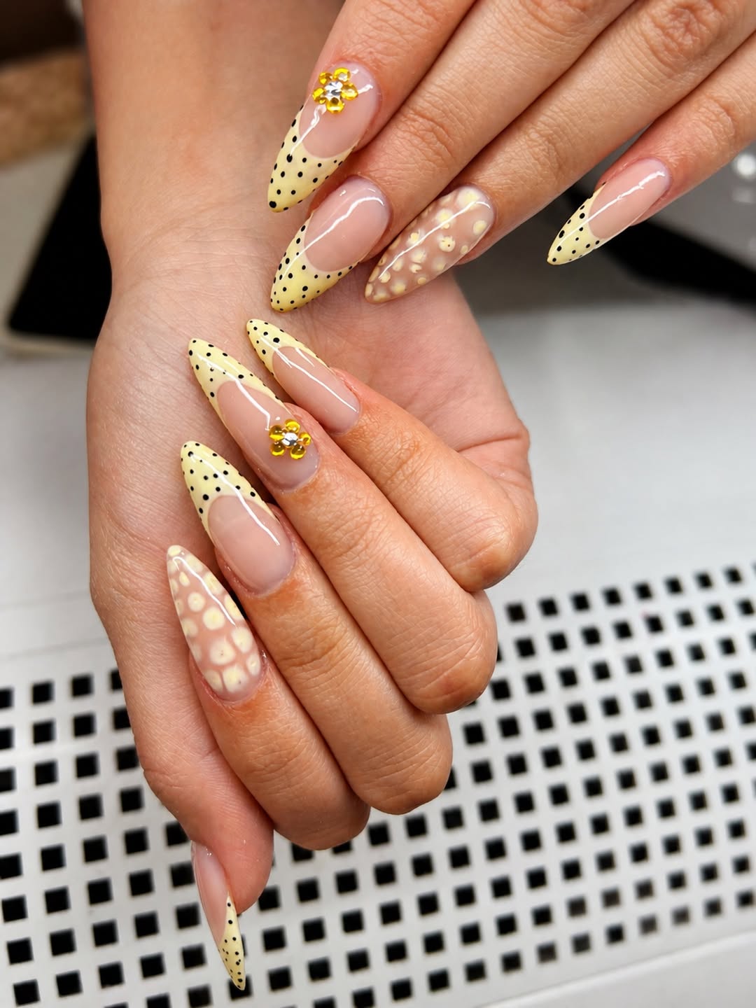Pale Yellow Polka Dot and Rhinestone Almond Nails