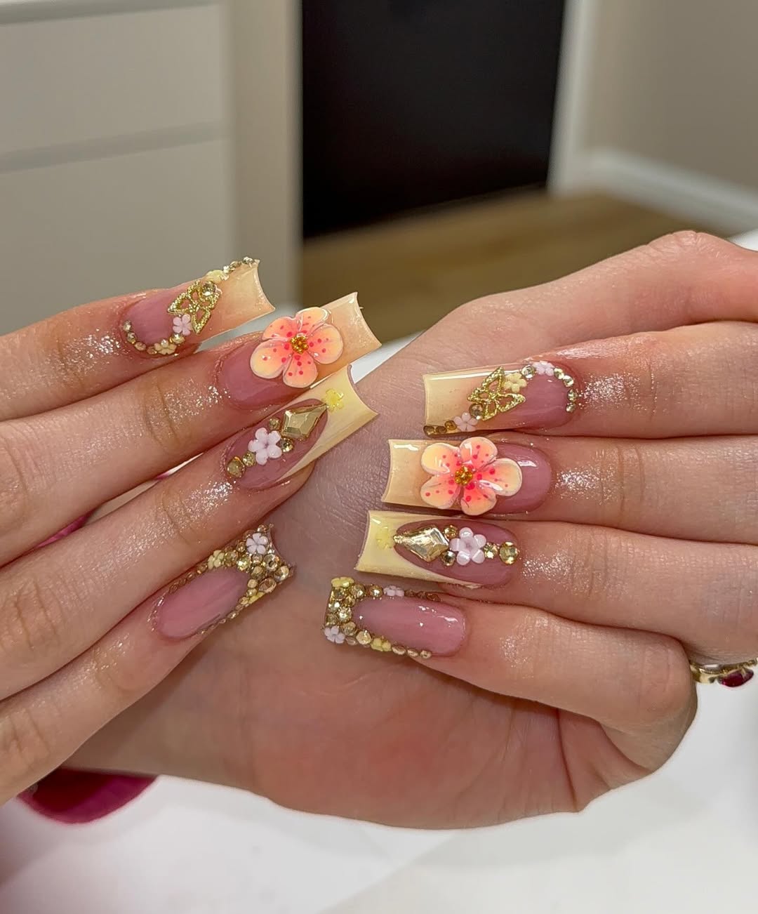 Pale Yellow Tips with Coral Flowers and Gold Charms