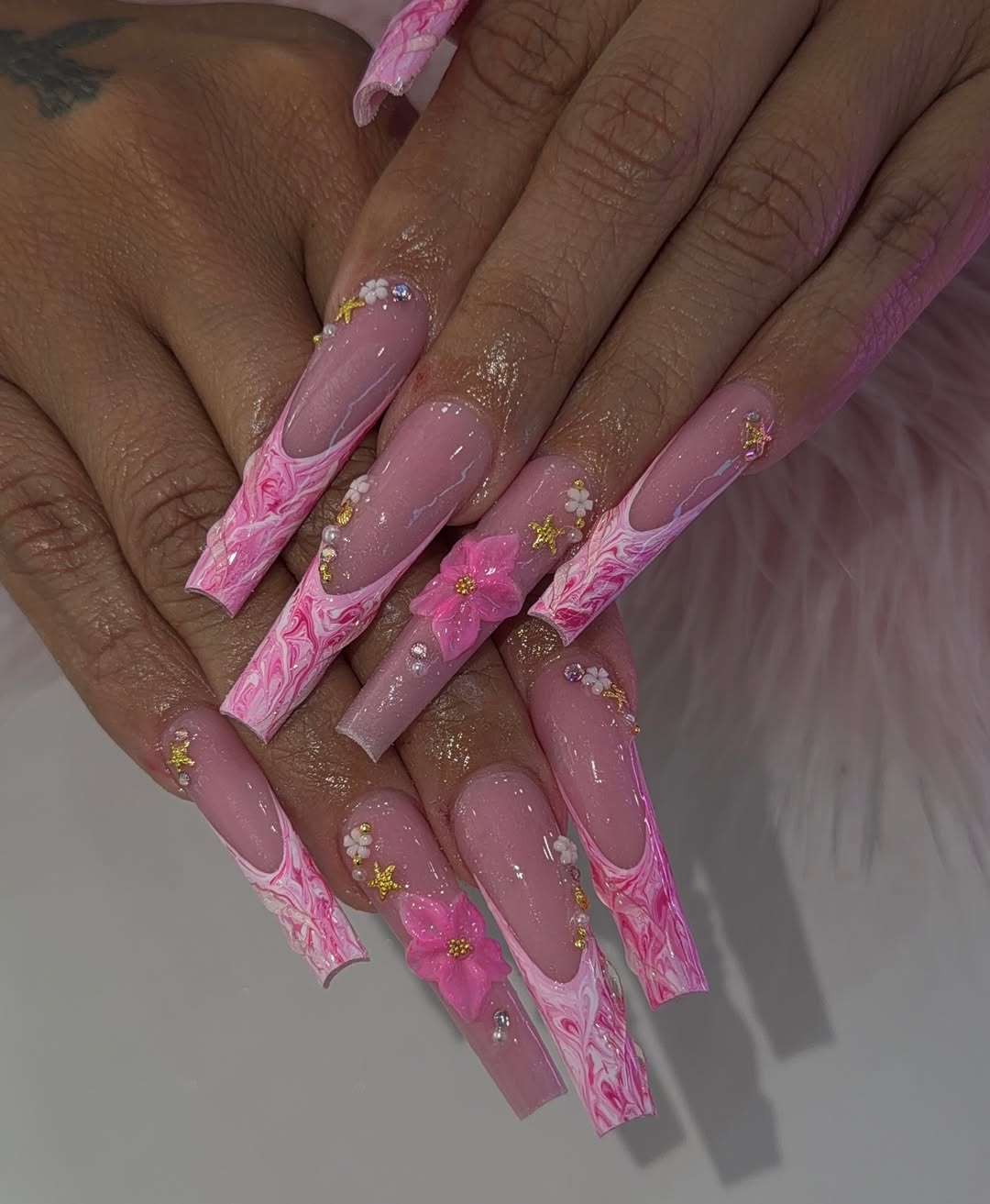 Pink Marble And Star Charm Nails
