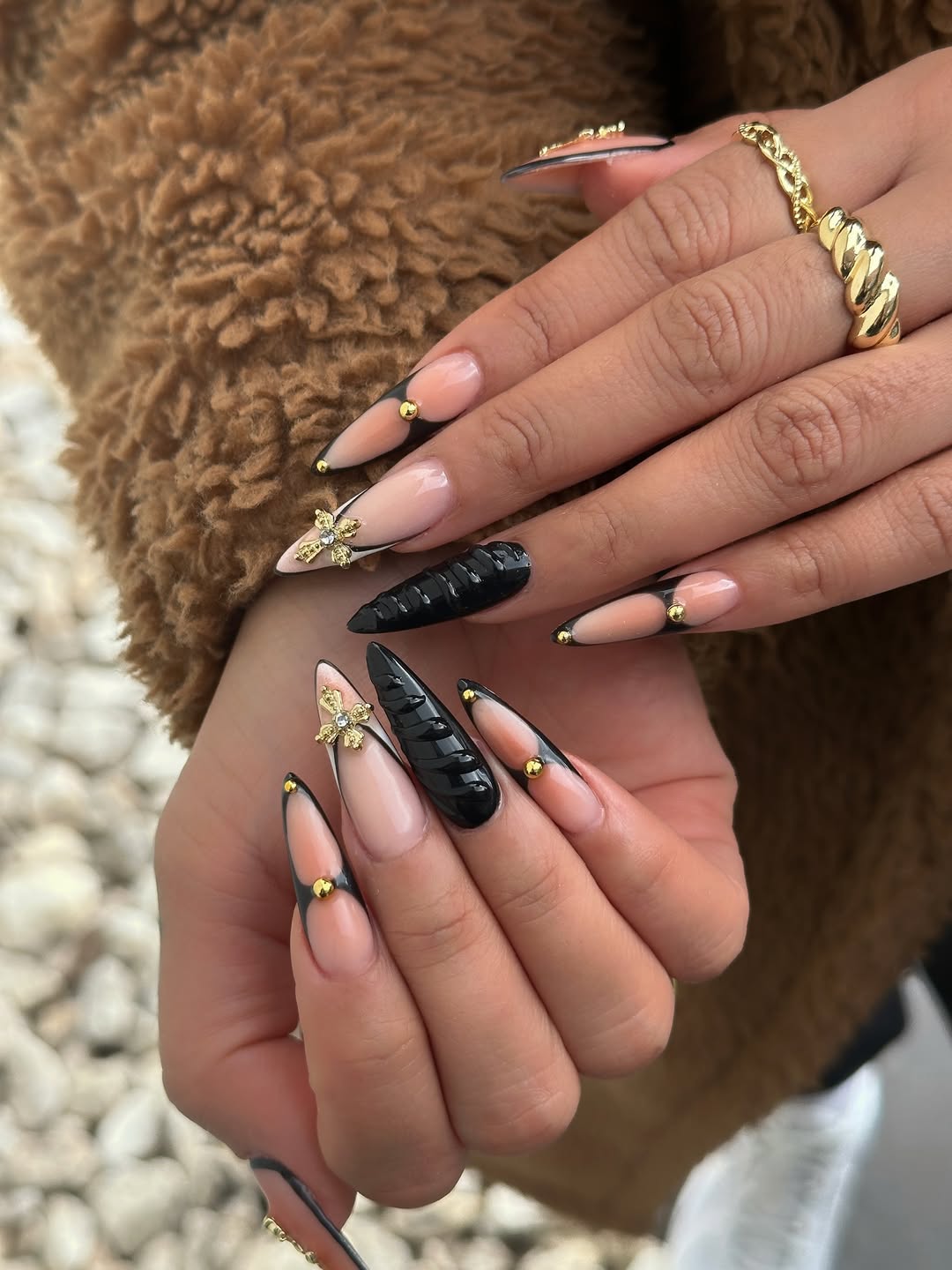 Pointed Nails with Raised Dark Textures and Cross Charms