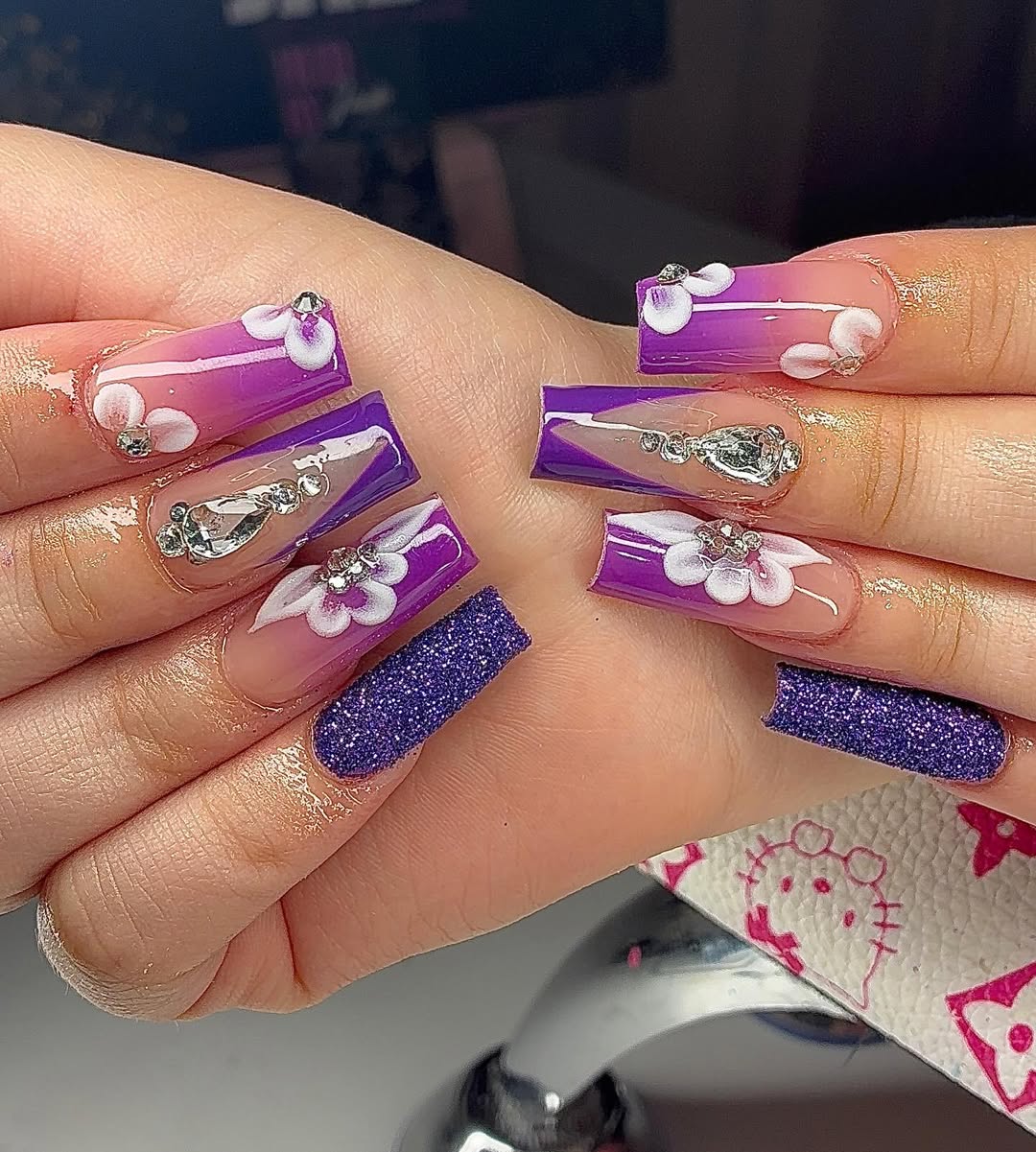 Purple Glitter And White Floral Acrylics