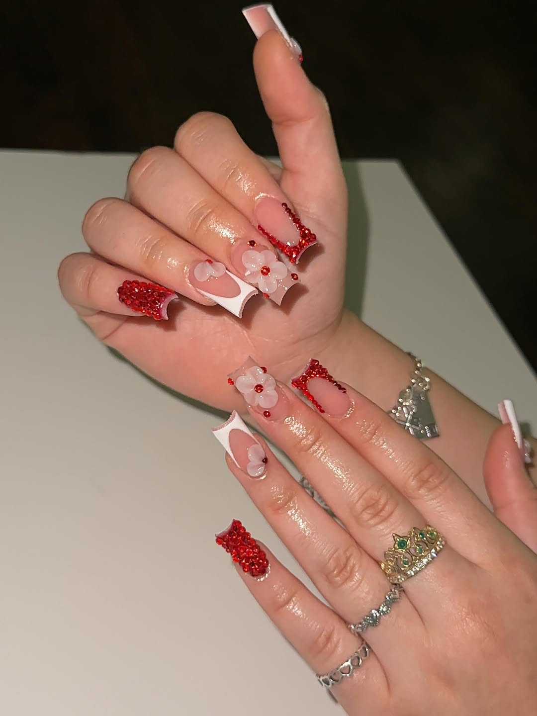 Red Rhinestone and White Floral Square Nails