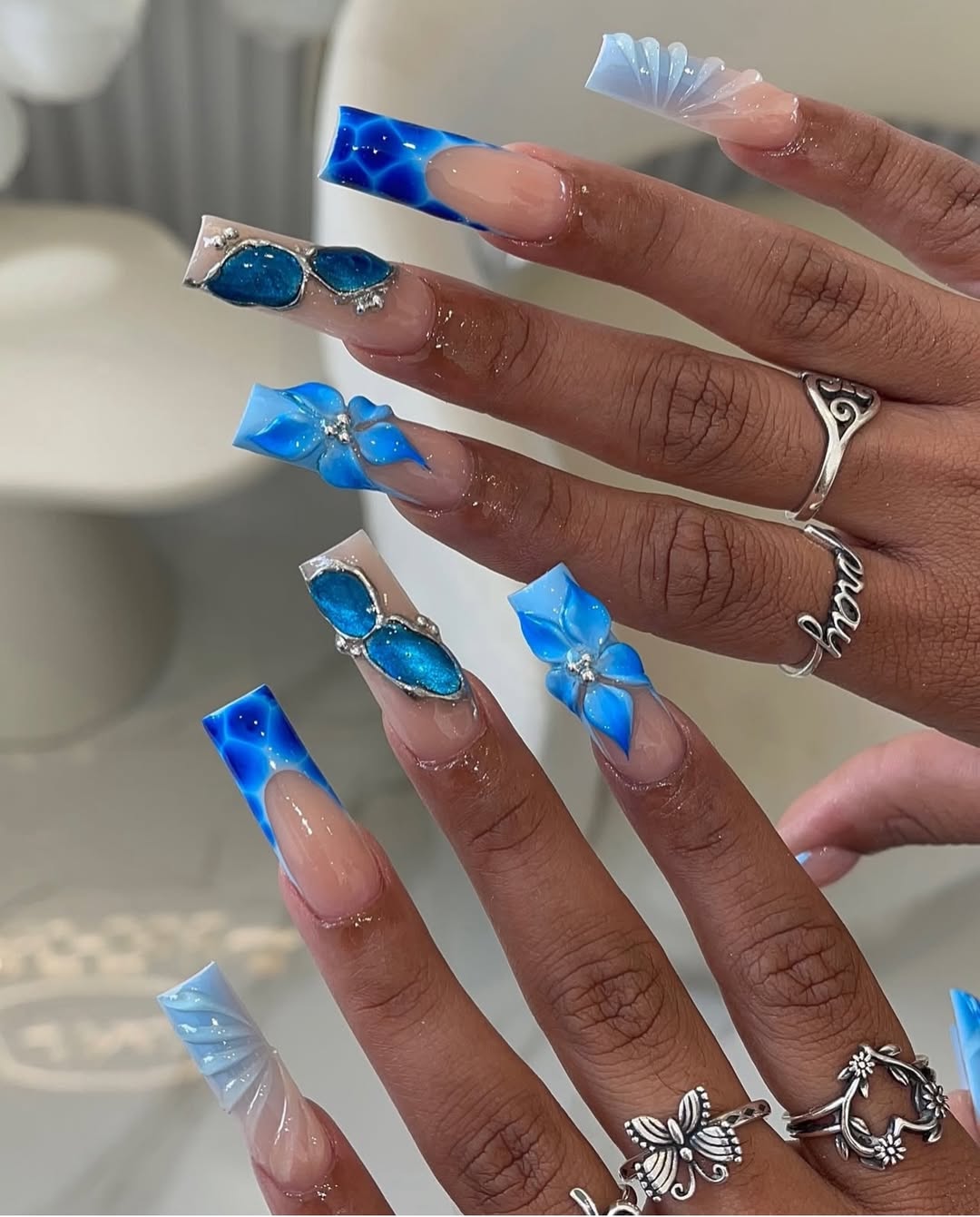 Sculpted Ocean Water and Floral Square Nails