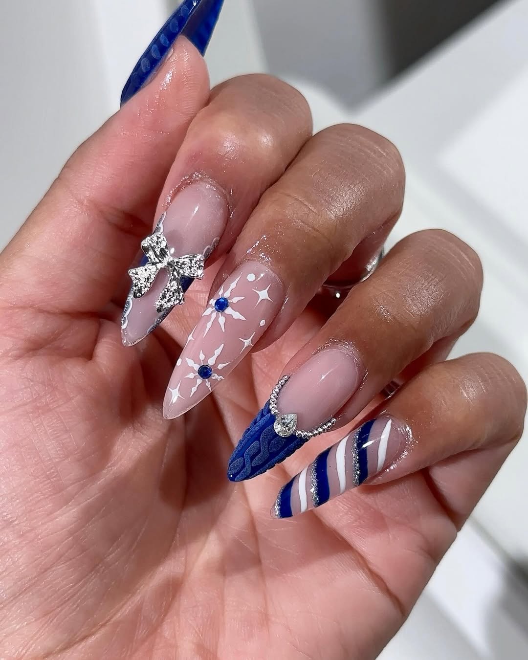 Silver Bow and Blue Textured Nails