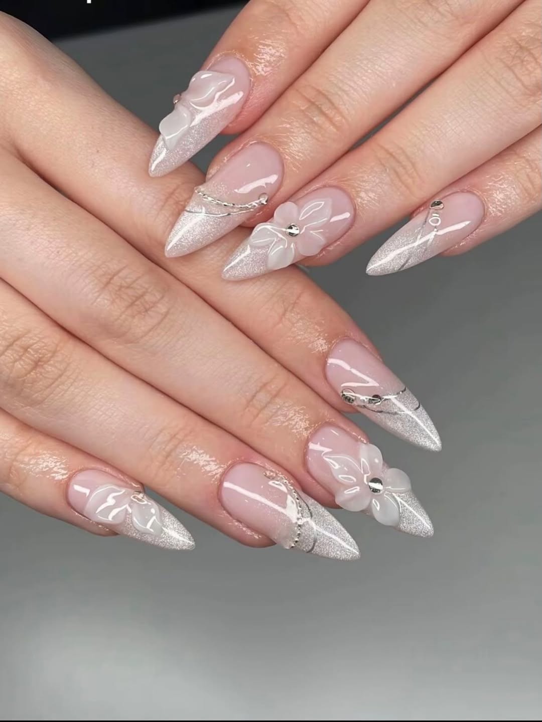 Silver Glitter and White Flower Almond Nails