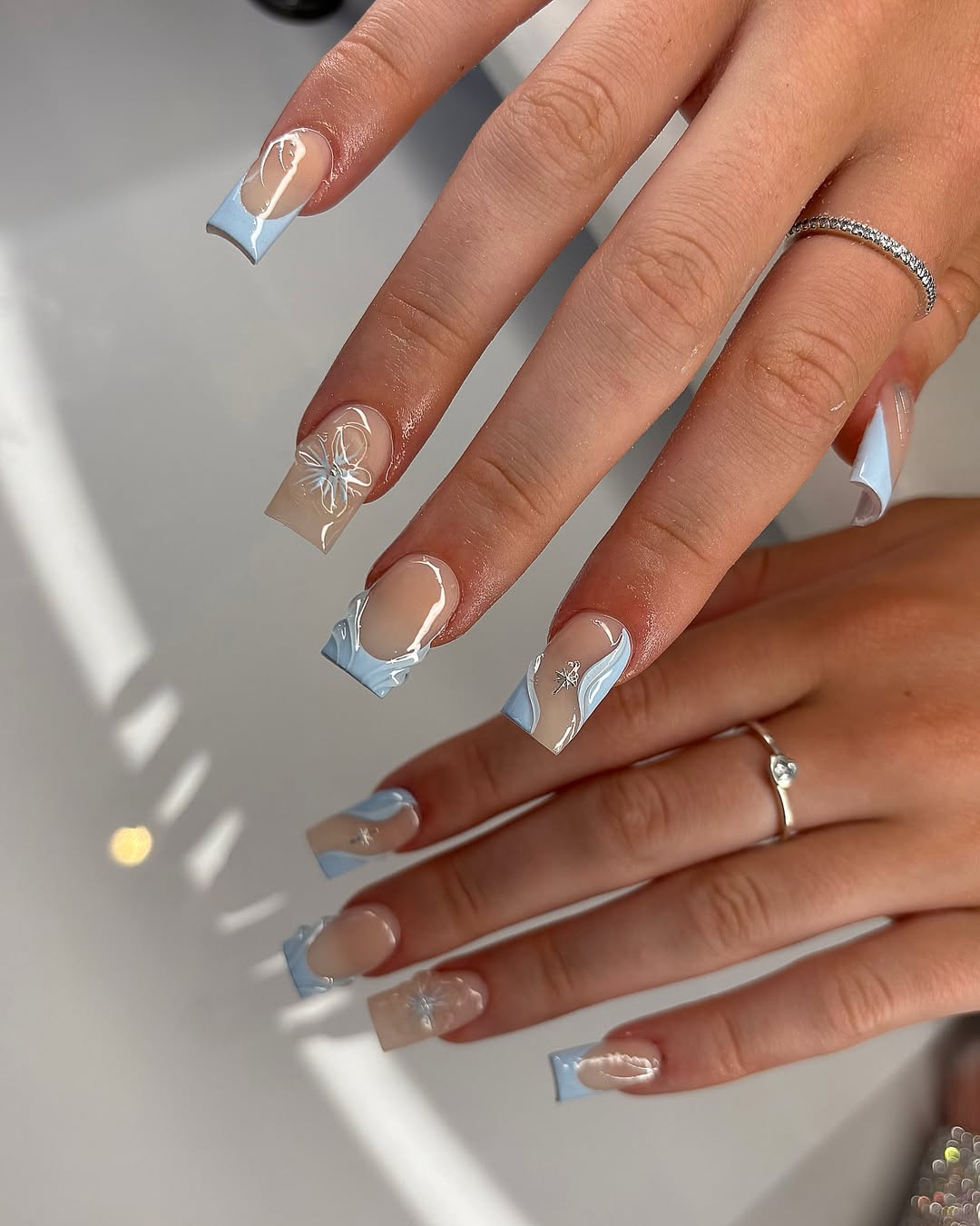 Square Tips with Abstract Blue Swirls