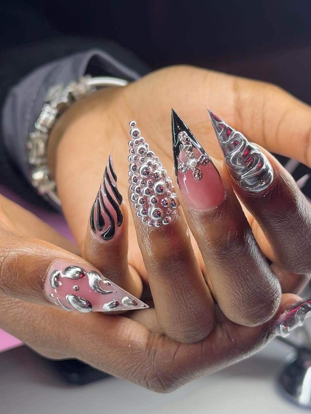Stiletto Nails with Metallic Spheres and 3D Art