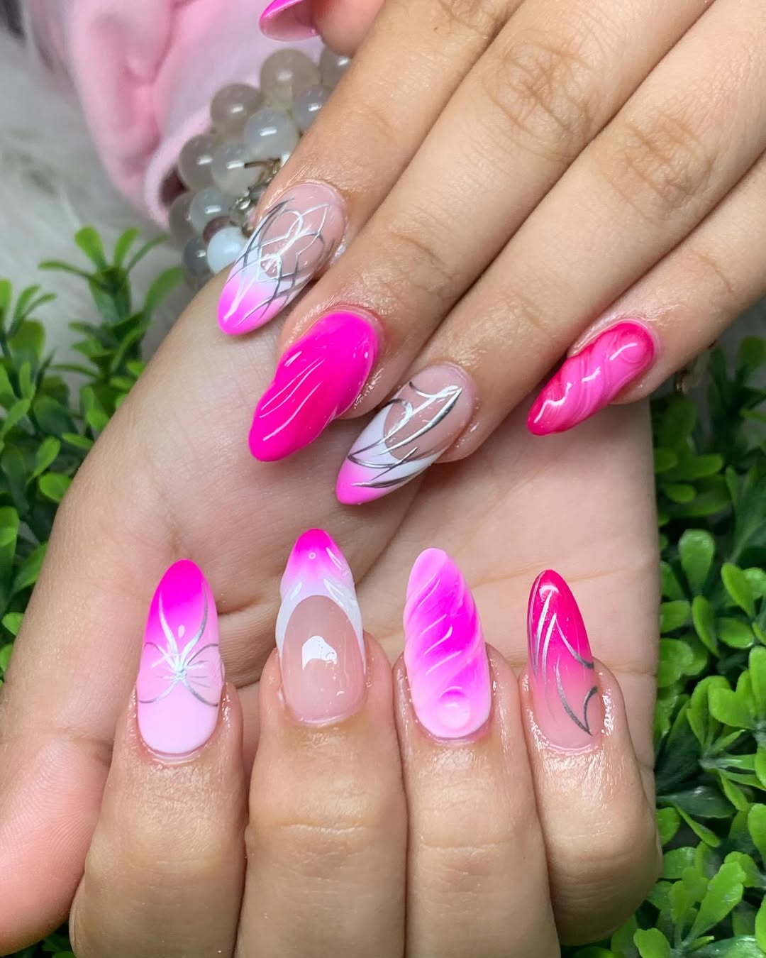 Vibrant Pink Almond Nails With Silver Details