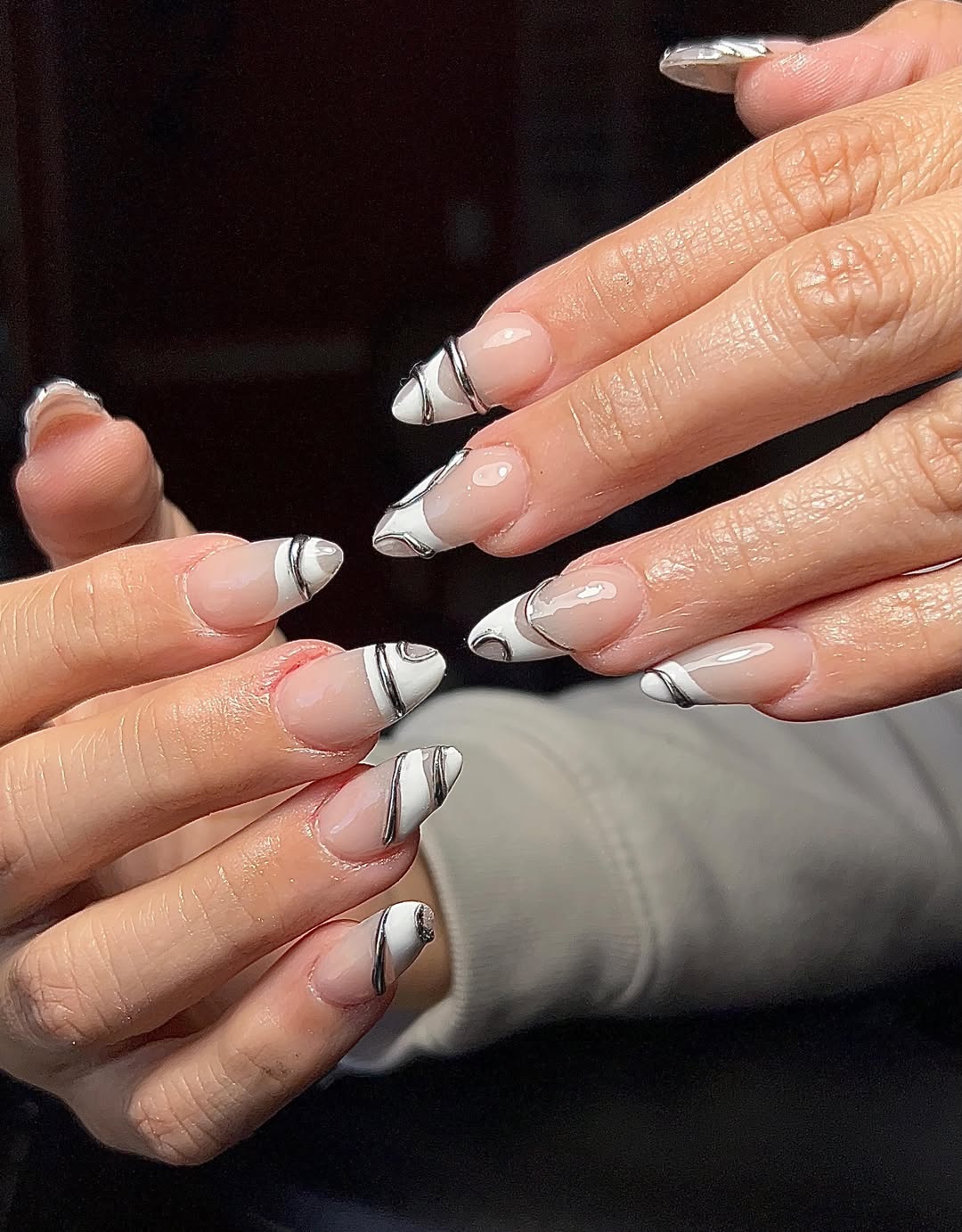 White Almond Tips With Chrome Swirls