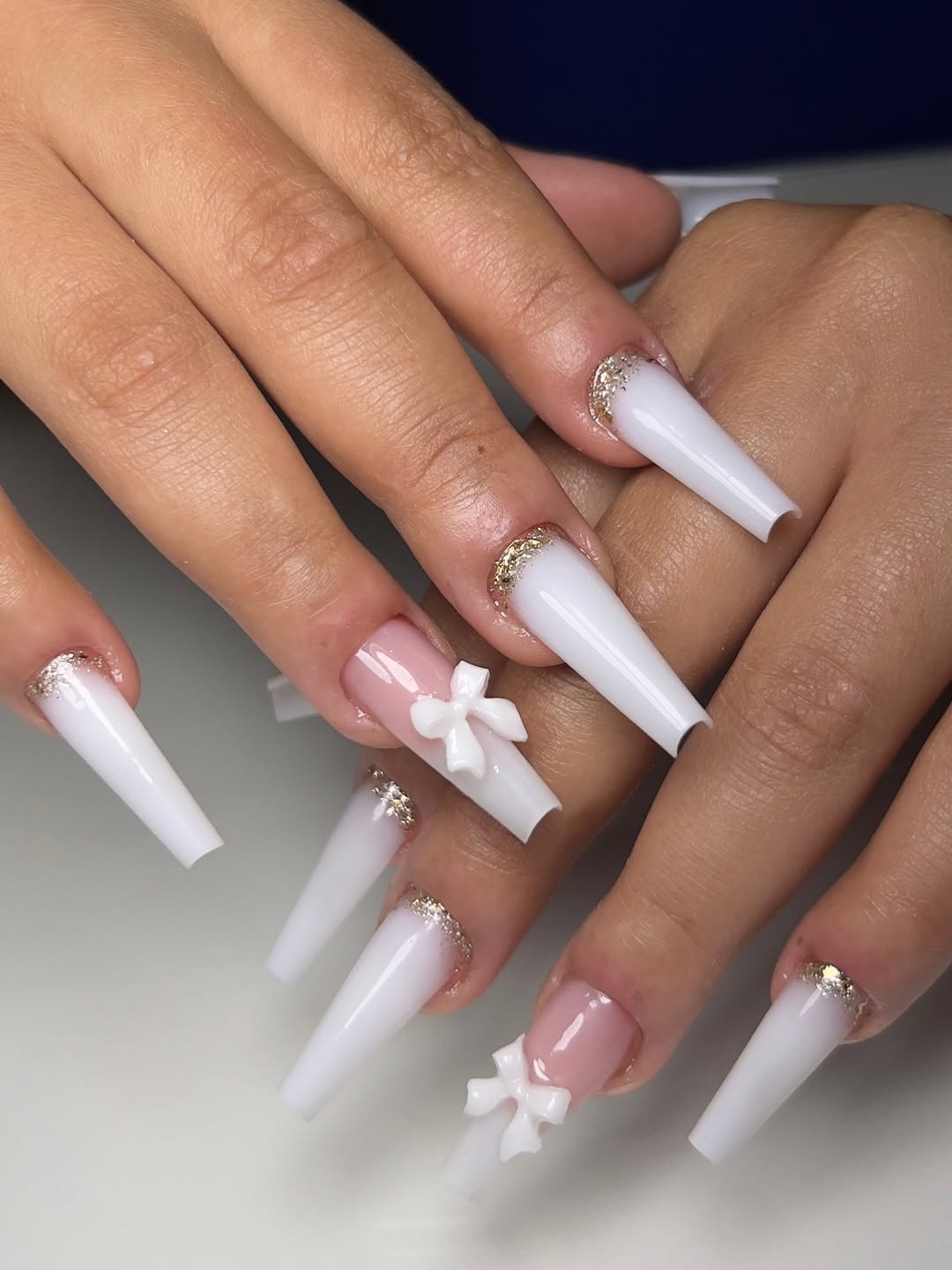 White Nails With Gold Glitter And Bows